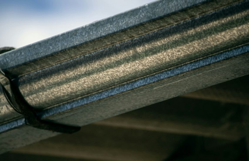 a close up view of a metal gutter